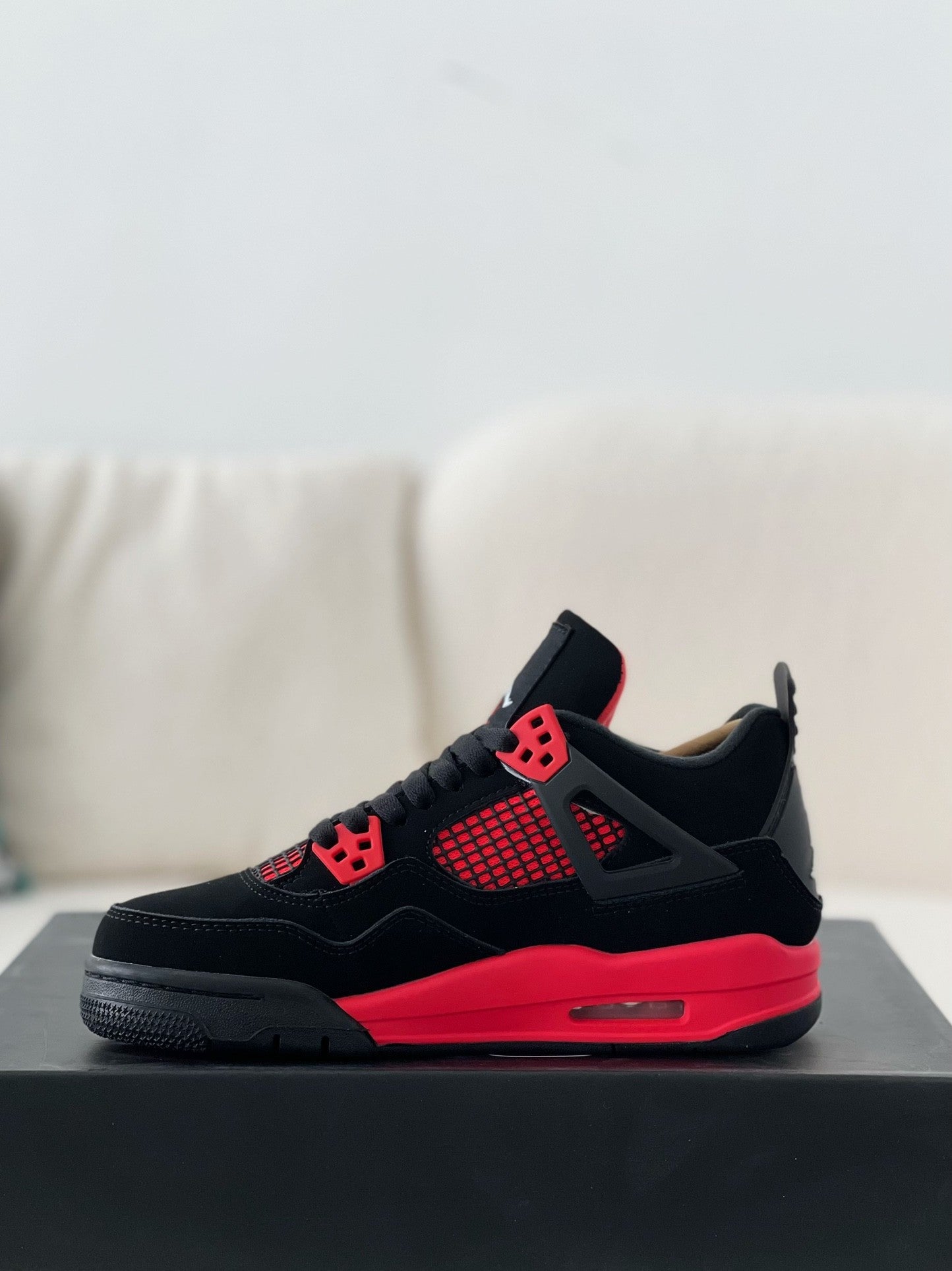 Air Jordan 4 Retro "Red Thunder"