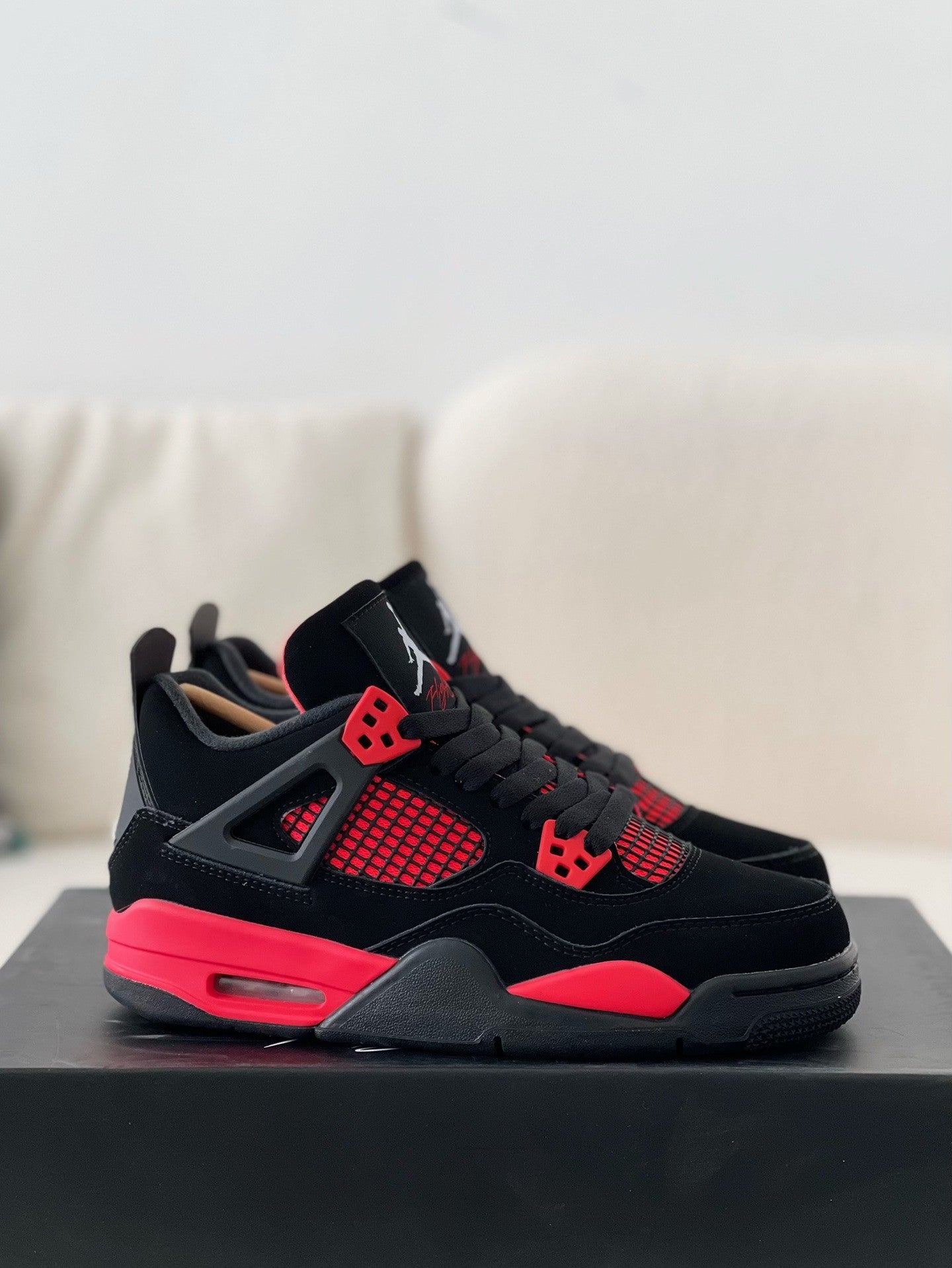 Air Jordan 4 Retro "Red Thunder"