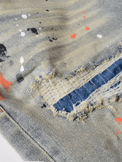 Blue Washed Ripped Patch Jeans
