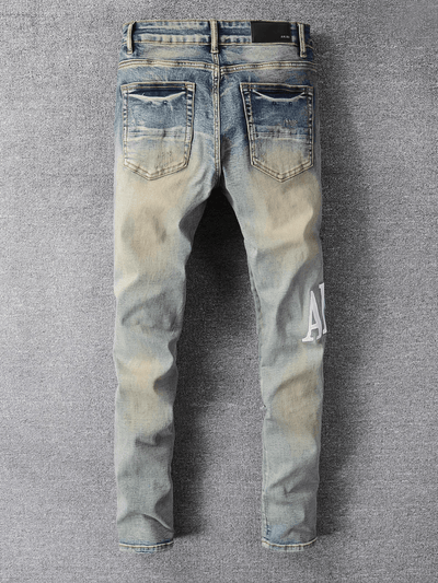 Washed Blue Ripped Writing Jeans
