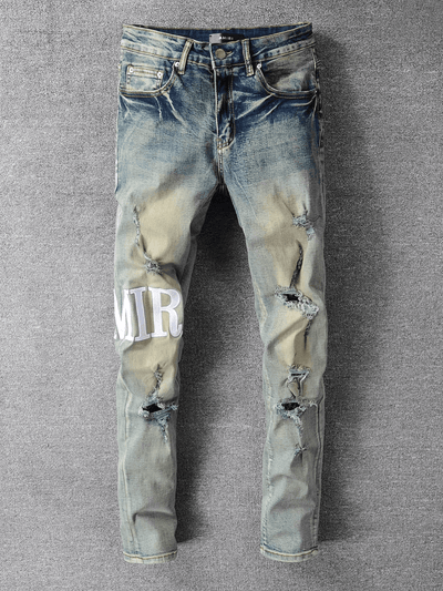 Washed Blue Ripped Writing Jeans