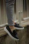 Black Tassel Slip ons